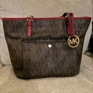 Used: Michael Kors Jet Set Medium Tote in Brown/ Wine.